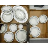 A large collection of Royal Doulton Burgundy patterned dinnerware to include, dinner plates, salad