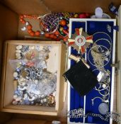 A Collection of Costume Jewelry including Silver Ingot, Bangles, coins, earrings etc