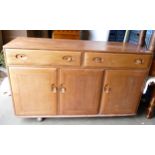 Mid Century Ercol Side Board, all drawer handles damaged, length 136cm