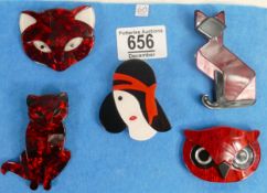 Five modern brooches