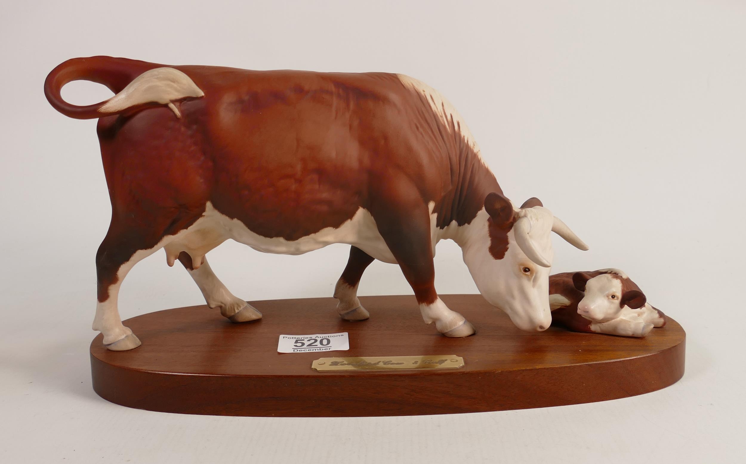 Royal Doulton connoisseur Hereford cow and calf on wooden plinth