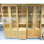 Blonde Ercol Modular Glazed Display cabinet, consisting of 2 display cabinets, central chest of