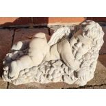 Stone garden ornament of a Baccus Cherub.