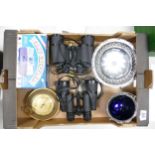 A mixed collection of items to include Tasco & Prinz binoculars, boxed vintage card shuffler,