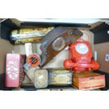 A mixed collection of items to include MG owners car badge, vintage red telephone, tin boxes etc