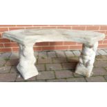 Stone garden ornament of a Squirrel seat, curved seat on squirrel plinths