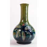 William Moorcroft vase decorated in the Iris design: On green ground, c1930, full signature &