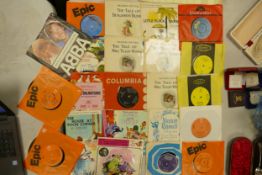 A collection of 7" Children's theme Vinyl records including Beatrix Potter items, Magic