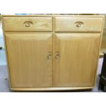Blonde Ercol Two Door two drawer Sideboard height 93cm, width 104cm and depth 43cm