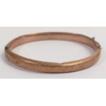 9ct rose gold bangle, 8.3g. (dented)