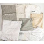 A collection of designer Handbag dust covers including: Jimmy Choo, Lulu Guinness, Manolo Blahnik,