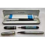 Three vintage fountain pens, Watermans 513, Parker and another. (3)