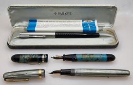 Three vintage fountain pens, Watermans 513, Parker and another. (3)