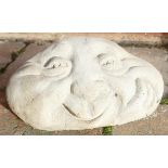 Stone garden ornament of happy face stones