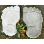 A pair of stone garden foot stepping stones