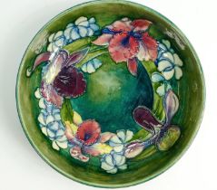 Walter Moorcroft large dish decorated in the Orchid design: Diameter 27cm.