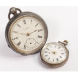 Two Silver pocket watches. back case missing from the larger one. (2)