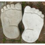 A pair of stone foot stepping stones