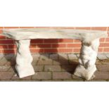Stone garden ornament of a large straight timber seat on Squirrel plinths