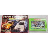Boxed Scalextric Team Cosworth part set together with Subbuteo 372/9924 boxed game set