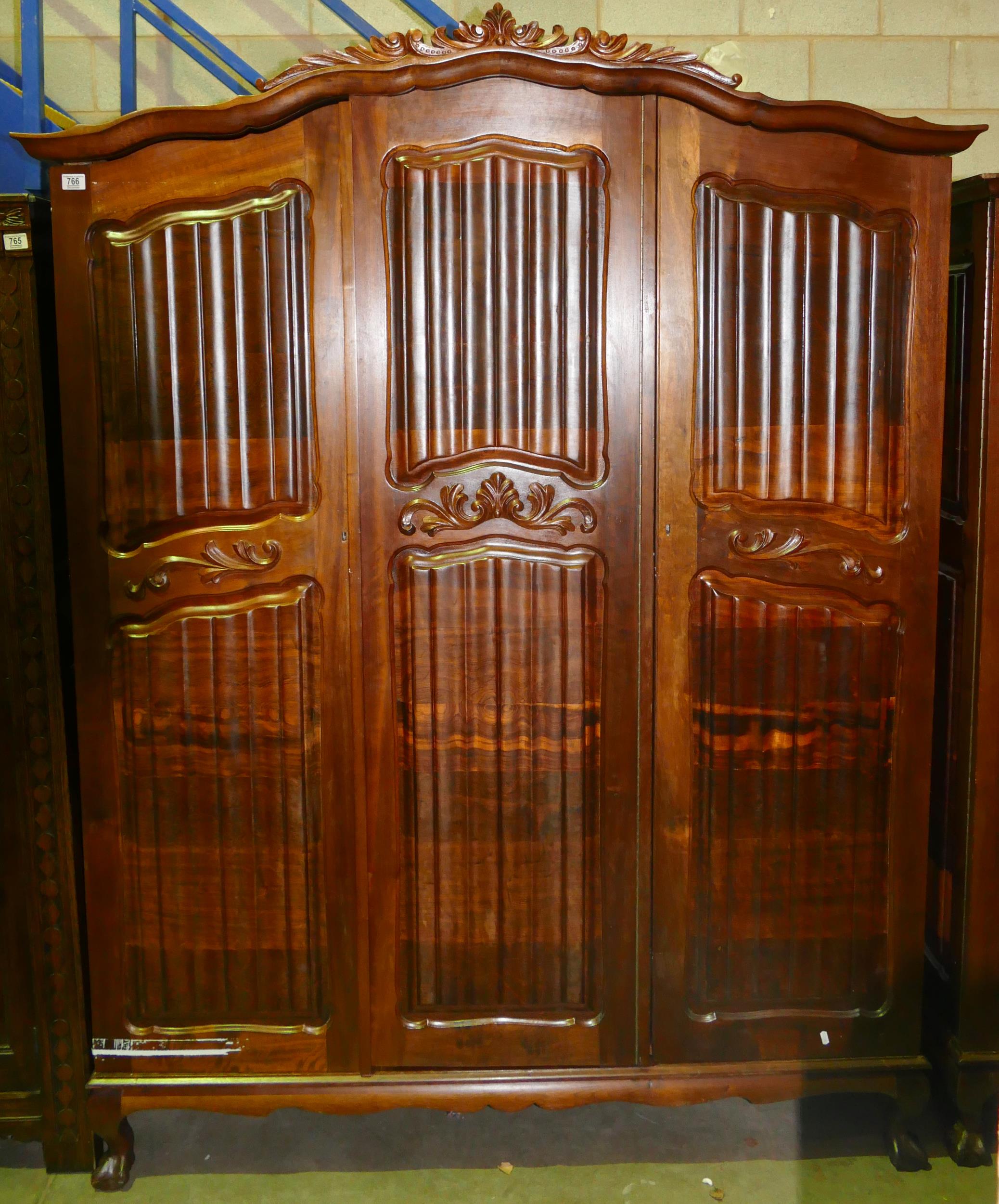 South African Hard Wood Carved Triple Wardrobe on Ball & Claw Feet, setectional in 4 pieces,