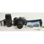 Canon EOS650 35mm film camera with ef 35-70mm & ef 75-300mm ultrasonic zoom lens with instructions &