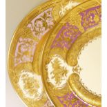 De Lamerie Fine Bone China heavily gilded Royale patterned Dinner plates in a pink colour, specially
