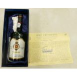 A bottle of Dona Antonia Vintage Port, in a presentation box to commemorate the decommissioning of