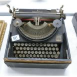 Vintage Imperial typewriter and case