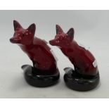 Two Royal Doulton Flambe Seated Foxes, height 11cm. One has both ears reglued