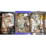 A large collection of novelty cat figures including Sylvac, Francesca pottery , resin & stone