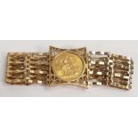 Gold Full Sovereign dated 1958 set in a decorative gate bracelet in 9ct gold,25.6g.