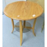 Ercol Blonde Coffee Table with smoke glass lower shelf, diameter 60cm, height 63cm