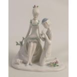 Rosenthal figure group by Raymond Peynet . Man with flute serenading a lady