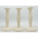 Three Wedgwood Creamware Candlesticks, height 20cm(3)