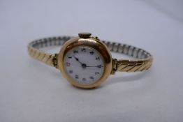9ct yellow gold cased watch, with enamelled dial, marked 375 to case, AF, hinge broken on expanding