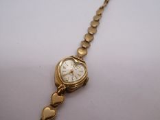 9ct yellow gold ladies cocktail watch by 'Everite' on interlocking 9ct yellow gold heart strap, 12.8