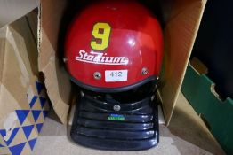 An old Stadium 9 motorcycle helmet
