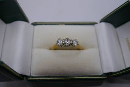 18ct yellow gold diamond trilogy ring, approx 0.5 carat combined, size O/P, marked 750, approx 3.4g