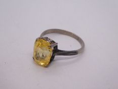 18ct white gold ring with large yellow stone, possibly yellow Sapphire, stone 11mm x 8mm, marked 18c