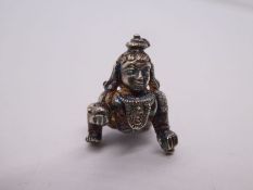 Unmarked white metal charm of a Hindu Deity