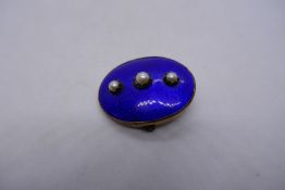 Oval yellow metal brooch with navy enamelling, set seed pearls, 3.5cm approx