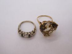Two 9ct gold dress rings, one with large heart shaped Topaz? and a Sapphire and clear stone example
