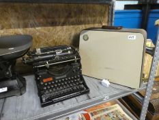 An Underwood typewriter, a set of scales and a sewing machine