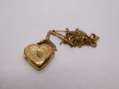 9ct yellow gold chain AF, hung 9ct yellow gold heart shaped locket, 3.5g approx