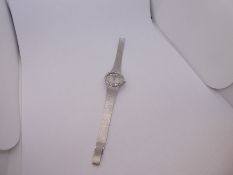 14K white gold ladies 'Eusi' wristwatch with diamond encrusted bezel, marked 585, 14K, 35.6g approx