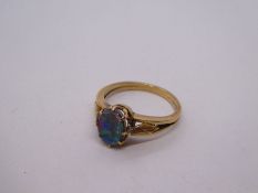 Yellow gold dress ring inset with an oval, flat cut opal, size O, 3.0g approx