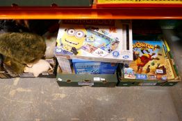 Three boxes of sundry, mainly games and cuddly toys
