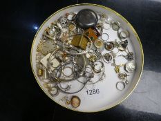 Tray of mostly silver costume jewellery, including earrings, rings, medallions, bangles