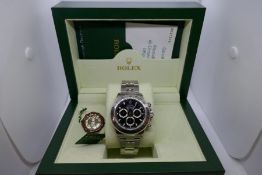 Rolex Daytona black dial watch, 2000 manufacture, unworn, complete with its original box, papers, st